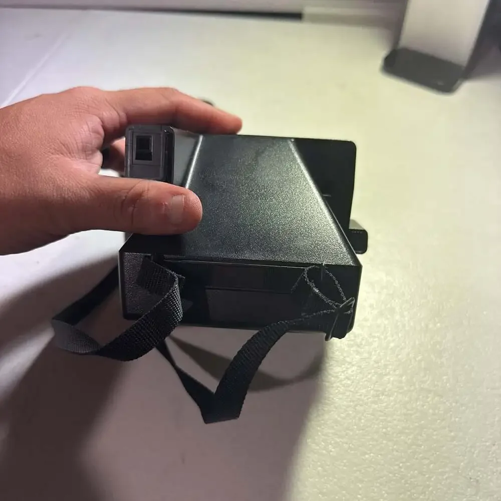 Vintage Polaroid Sun 600 LMS Instant Camera with Strap
